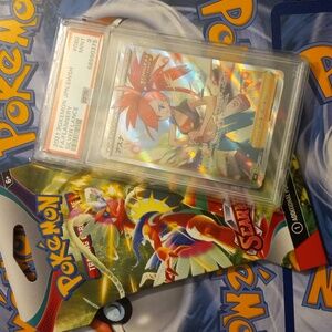 PSA and one Pokemon tcg booster pack